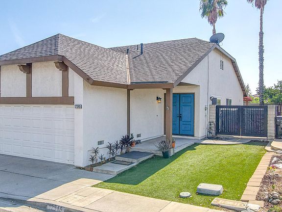 Newly exterior paint with charming blue door