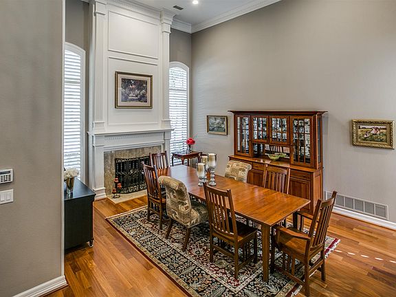Fireplace in dining room makes for COZY gatherings