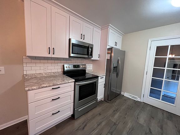 4th image of 10869 Woodbushe Dr SE