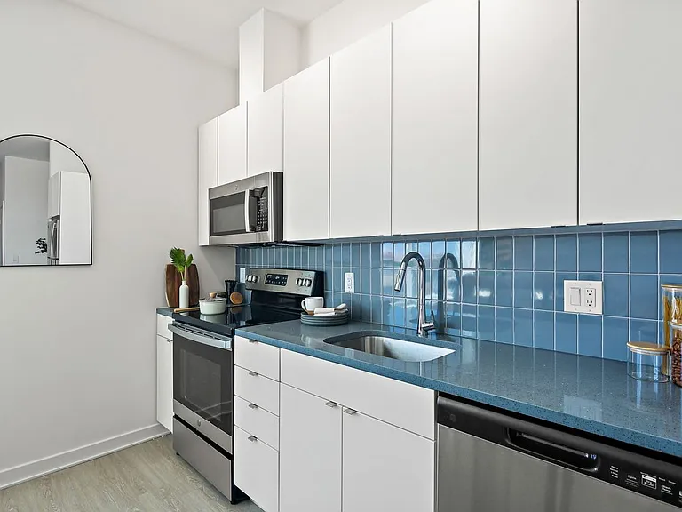 Modern Kitchens with Tile Backsplash & Quartz Counters