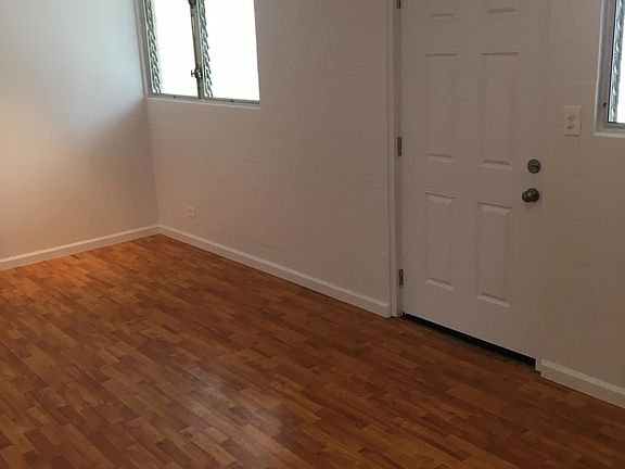 Front door. Open Living/Dining/Kitchen floor plan.