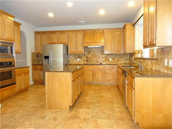 Beautiful maple cabinets and stainless appliances!