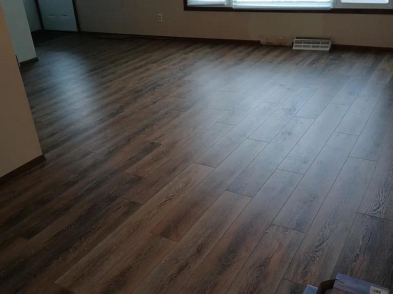 Living room with new LVP flooring 12-23-24.
