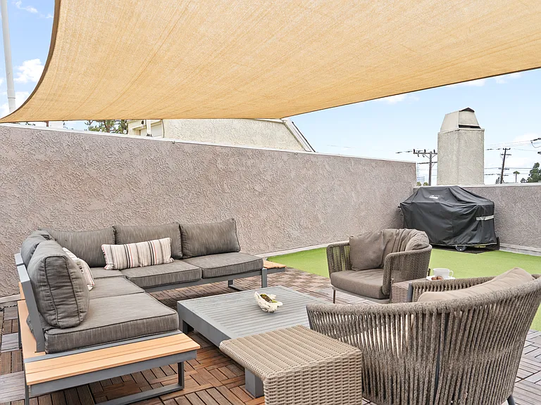 BBQ, gas hookup, and electric on this deck! Furnished just for you