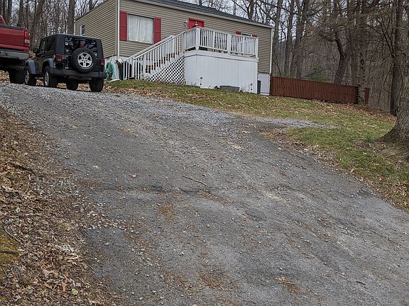 Asphalt Drive- gravel at top