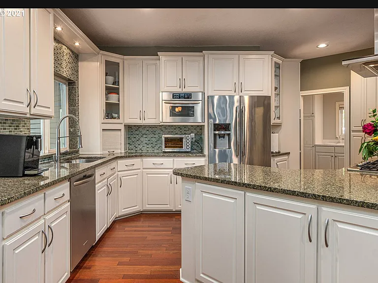 12404 NW Woodland Ct — Photo 7