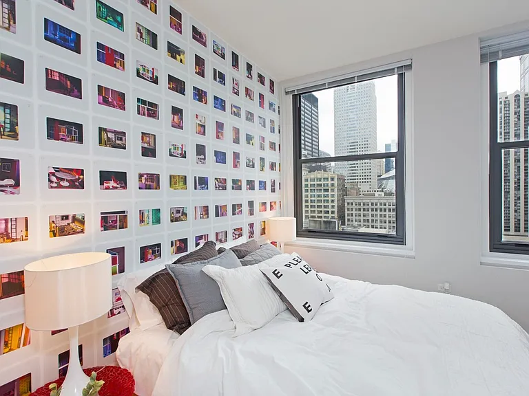 63 E Lake Apartments bedroom with Chicago city view