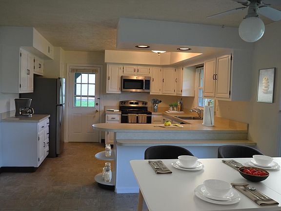 Kitchen with brand new appliances - virtually staged