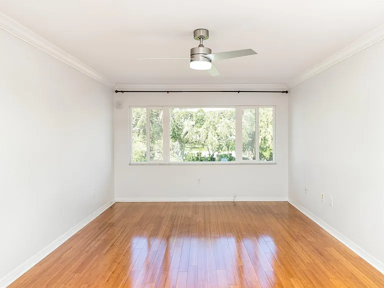 Bamboo flooring throughout the condo 10 Foot window Overlooking the lake on the second floor. Wifi modern zebra blinds.