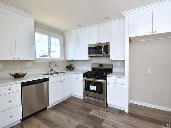 Refrigerator not pictured but included.