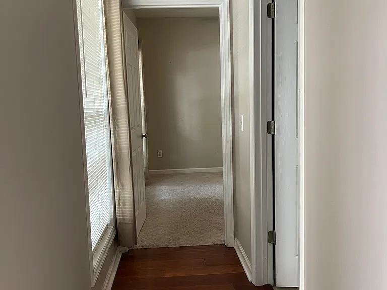 Hall way leading to front bedroom