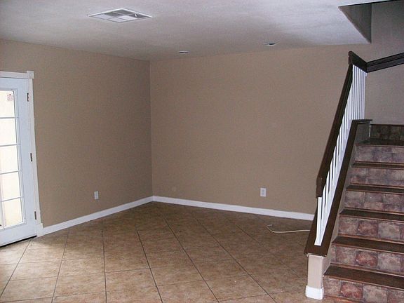 Living room in this 2 story unit