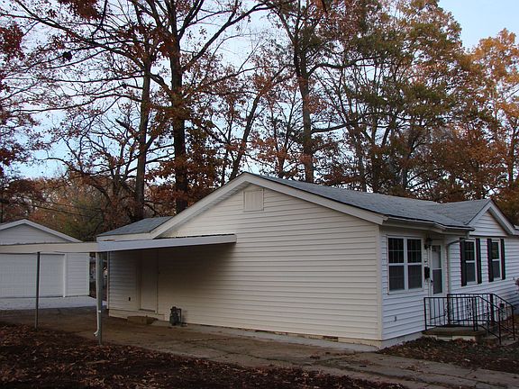 Covered Carport on side of home