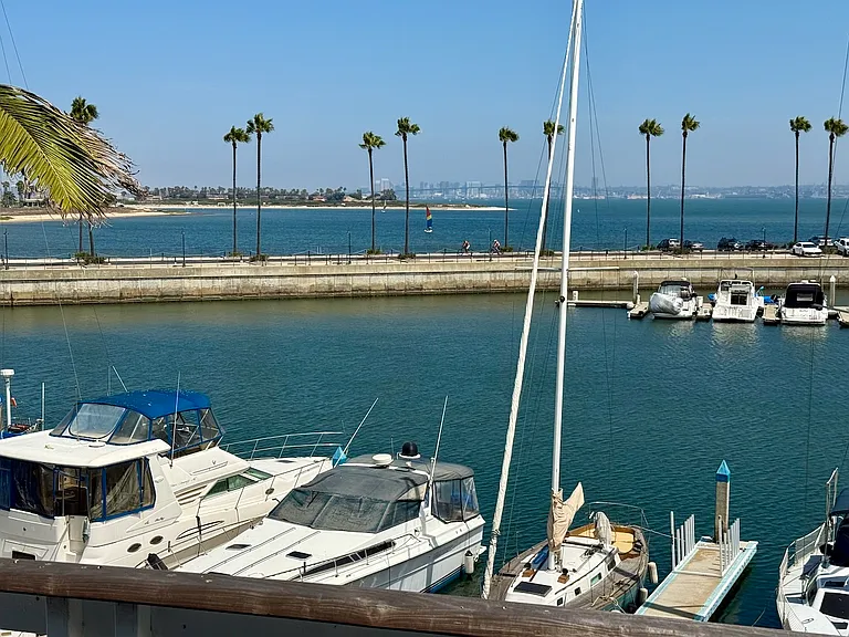 Daytime view across marina towards Coronado Bridge and Downtown San Diego from the Master Bedroom's balcony/deck.