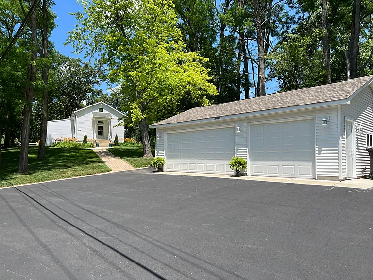 NEW 3-Car Garage. 
NEW Asphalt Driveway.
Private Dedicated Garage.