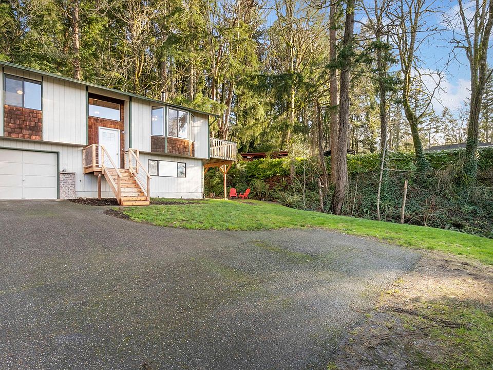 Welcome to The Laurel Duplex! Located Central Kitsap, the property is at the end of a very private drive and has room for two vehicles to be parked.