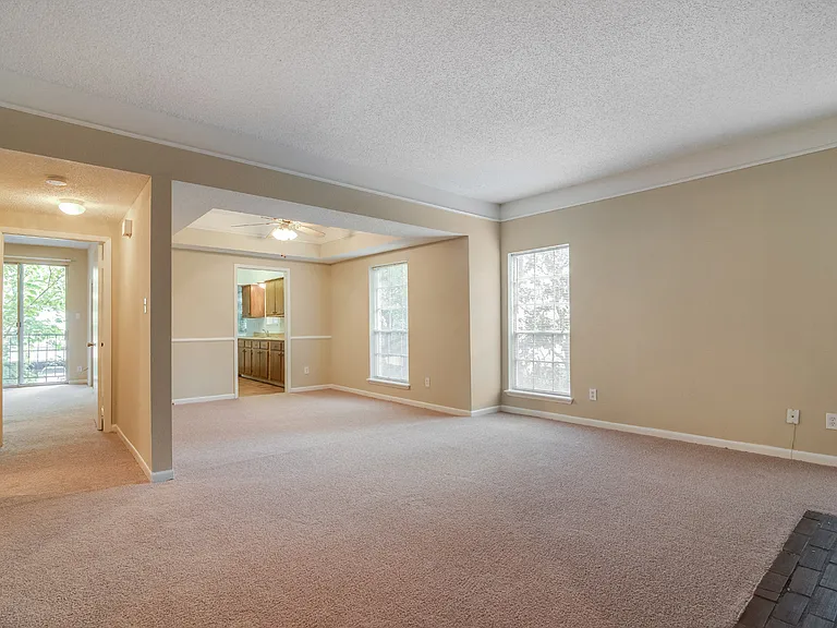 Large windows let in lots of natural light and select homes feature balconies