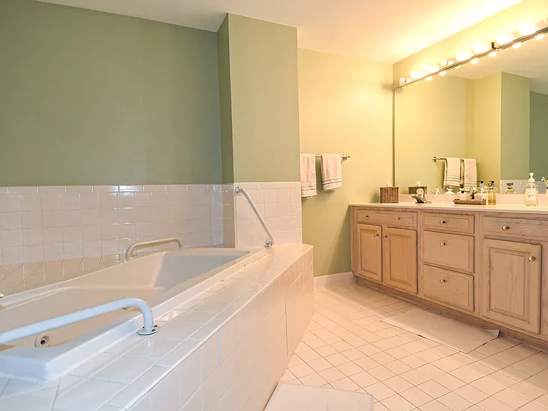 5450 Whitley Park Ter #212 — Photo 15