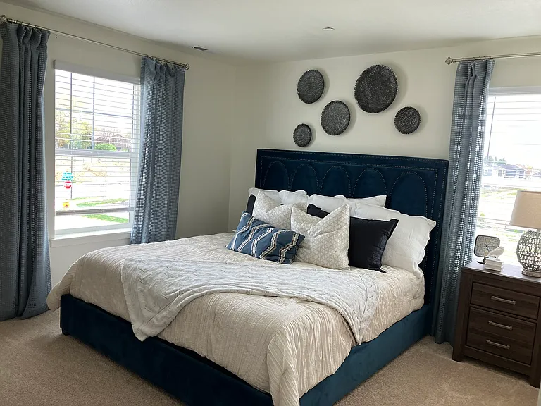 Sample of same floor plan, different finishes, staged with furniture.
