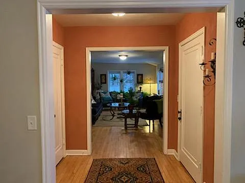 Front entry door on right. taken from dining room