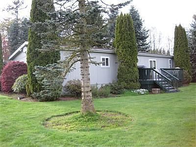Beautiful planting beds and mature landscaping