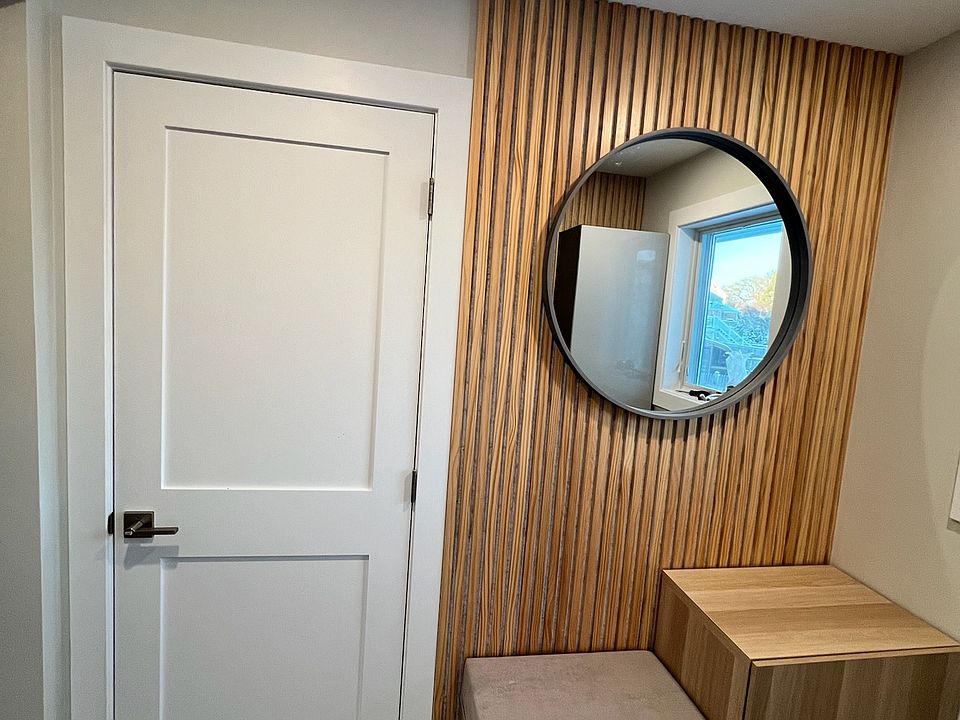 Back entrance with access to basement