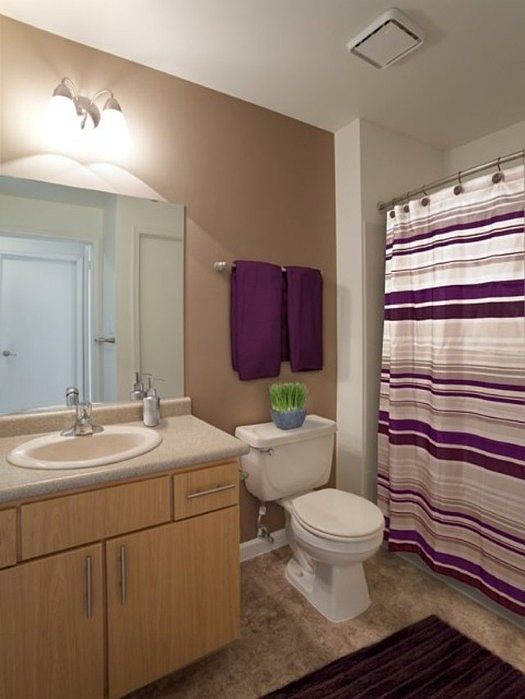 Well lit bathrooms with ample cabinet space