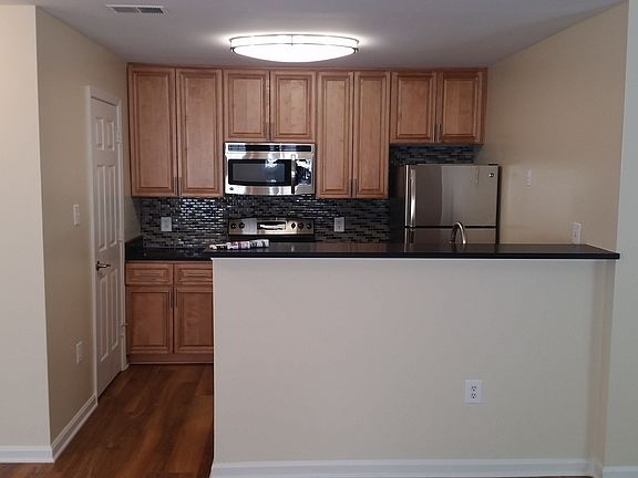 2nd image of 5804 Woodlawn Green Ct APT H