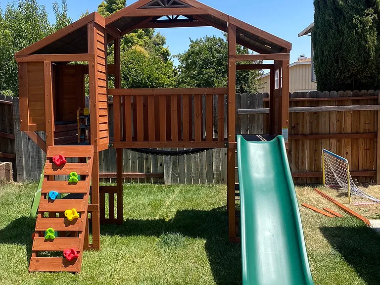 Outdoor play set can be left if requested .