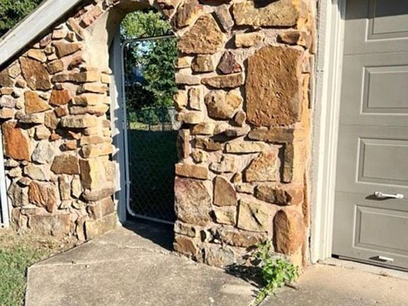 back yard & side garage door entry