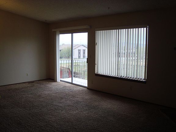 Great room sliding glass door exit to the balcony