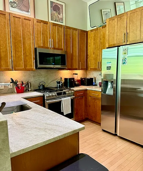 Top-of-the-line kitchen appliances and granite countertops.