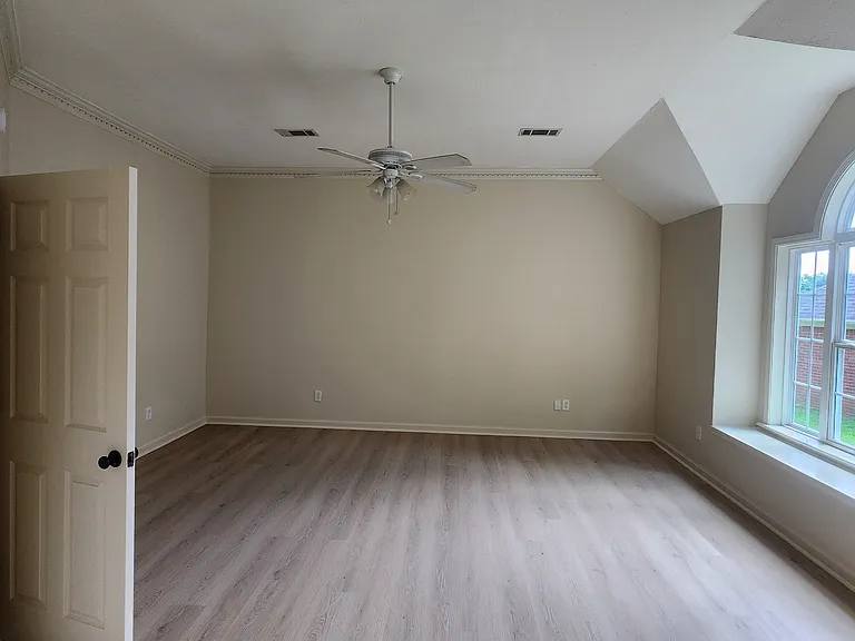 Large Master Bedroom with new Vinyl Plank flooring