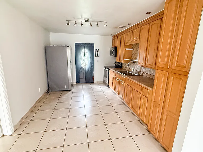 5627 Simms St — Photo 40