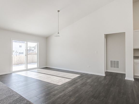 Sun-lit dining area off kitchen