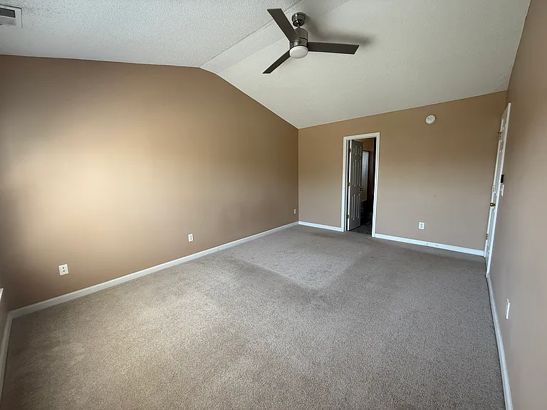 Owner's Suite with en suite bathroom and walk-in closet.