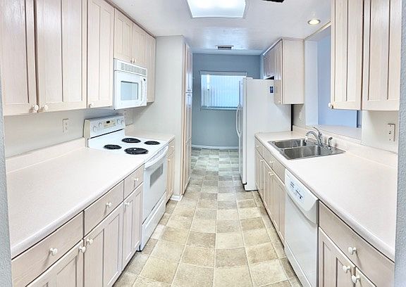 Galley Kitchen with Breakfast Nook in foreground