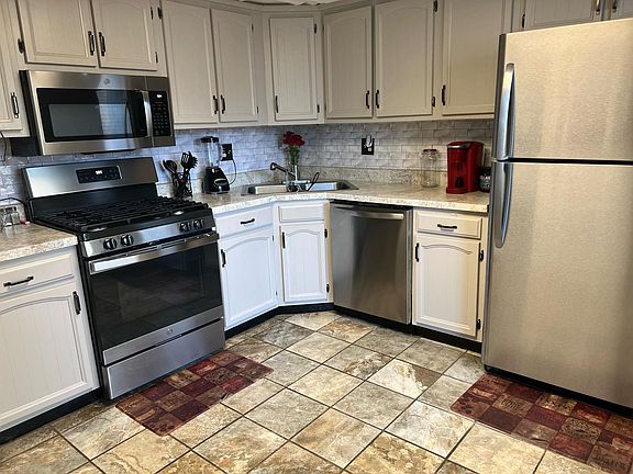 3rd image of 322 E 60th Ct