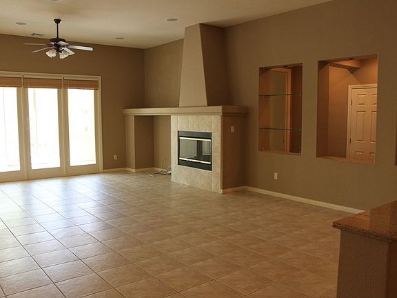 Huge Great Room with Fireplace, Surround Sound, Glass Shelves