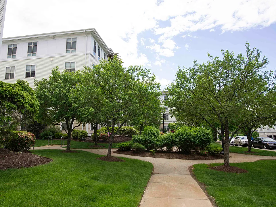 Located on Thirteen Lush, Landscaped Acres with Inviting Outdoor Common Areas