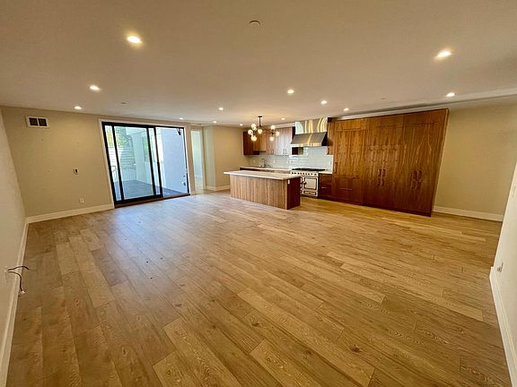Kitchen open to great room. Large attached deck