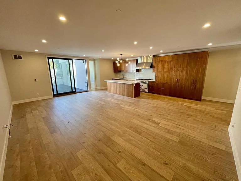 Kitchen open to great room. Large attached deck