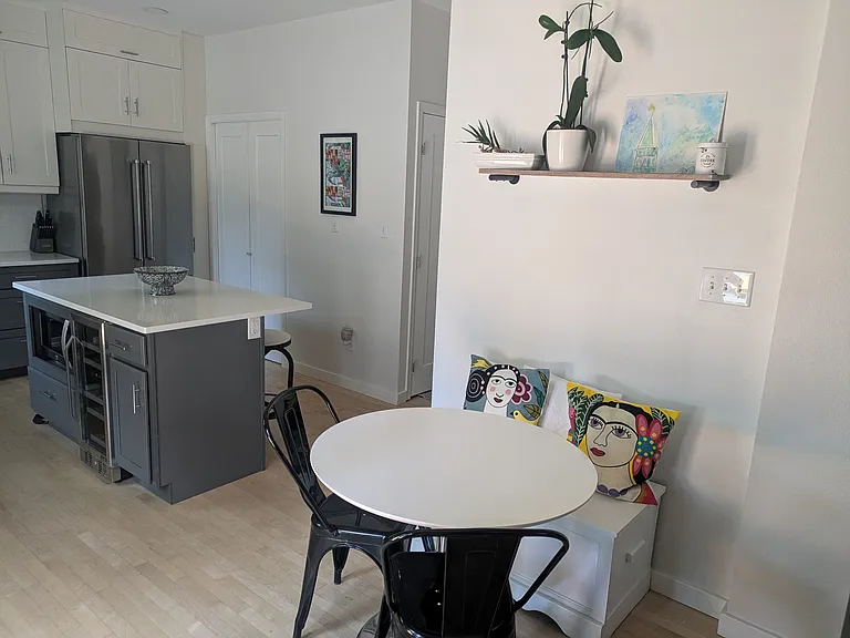 Kitchen includes large pantry behind pocket doors. Cupboards are extra deep.