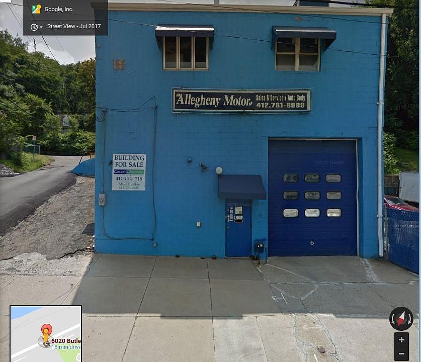 Two story building. Lift on first floor, paint box on secon