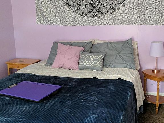 Q bed, double closet, ceiling fan, dresser