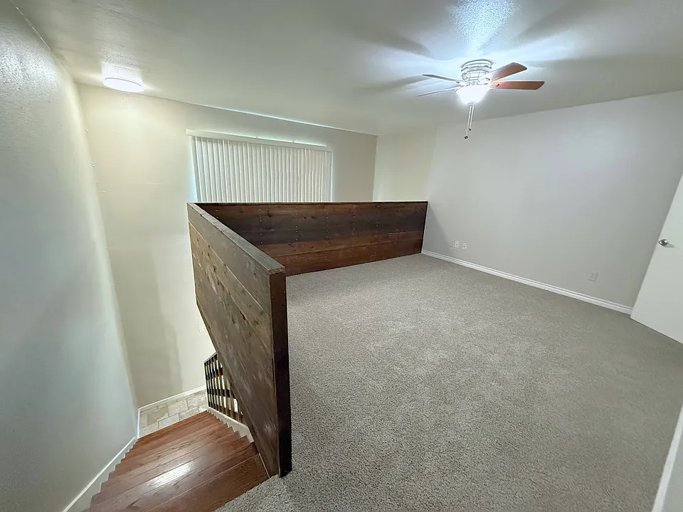 Comfortable Loft bedroom with natural light and generous closet space.
