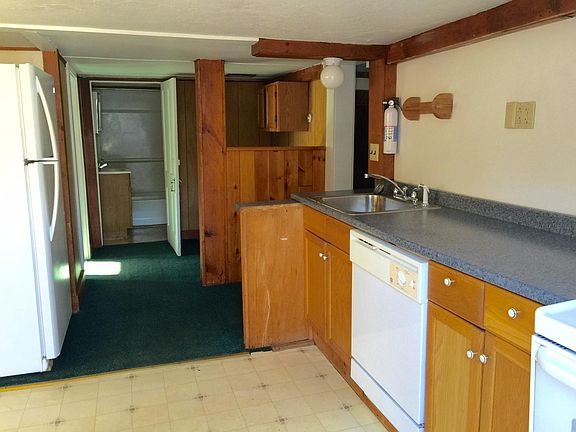 There are laundry hookups by the bathroom and also laundry facilities in the building.
