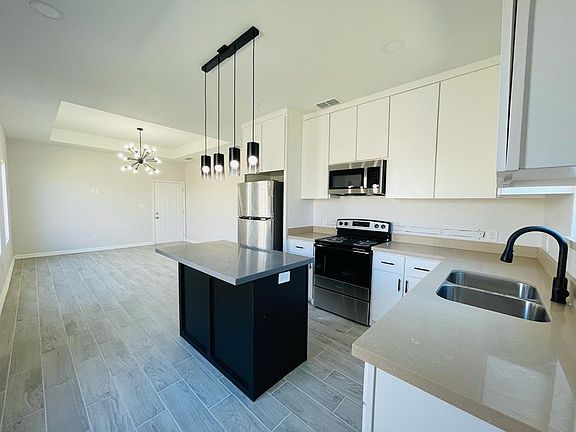 2nd image of 1301 S Xanthia St #1