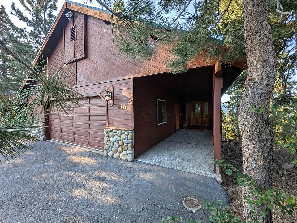 Exterior front with attached garage