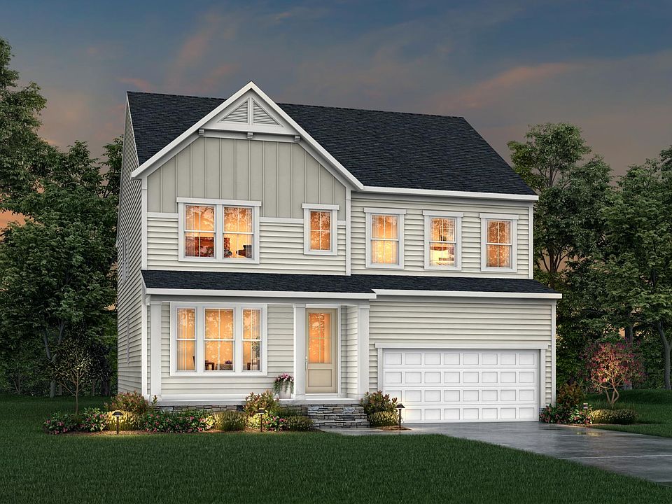 stone, siding, board and batten house with front porch